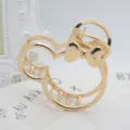 Gold metal hair claw clip with bow design, stylish and elegant hair accessory for women. - Mickey Shape