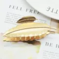 Minimalist gold leaf hair claw clip for women, large metallic hair accessory for styling. - Single Leaf Clip