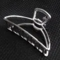 Minimalist silver zinc alloy hair claw clip, large metal hair catcher for daily wear. - Large Silver Curved Shape