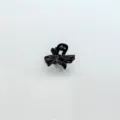 Detail shot of a black alloy mini hair claw clip featuring a cute bow design for hair. - Bow / Black