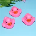 Cute pink floating rubber ducks, LED flashing bath toys for babies and kids water play. - Pink