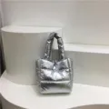 Silver metallic puffer tote bag detail, stylish quilted down cotton crossbody handbag for women. - Silver