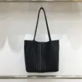 Black woven leather tote bag detail showcase, stylish large capacity shoulder bag close-up - Black