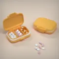 Draagbare 3-compartiment pillendoos reisopslagorganizer voor dagelijkse medicatie. - Oranje