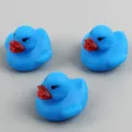 Set of 3 blue rubber duck bath toys with red beaks, cute water-sensing flashing LED toys for babies. - Glowing Blue Ducks