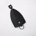 Estuche de cuero PU negro para llaves de coche con anillo metálico y botón de presión. - Estuches para llaves - negro