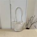 Summer fashion hollow woven leather bucket bag casual tote handbag with top handles. - White