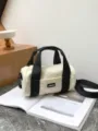 Casual nylon cylinder shoulder bag for women, lightweight commuter crossbody handbag with black straps. - Off White