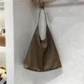 Brown soft leather slouchy shoulder bag, large capacity daily tote with detailed texture. - Tan