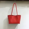Red woven leather shoulder tote bag, stylish woven design underarm bag, casual basket handbag detail. - Red