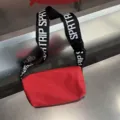 Red waterproof cylinder crossbody bag, stylish wide letter strap shoulder bag for women. - Red