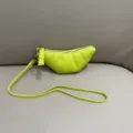 Neon yellow mini croissant dumpling bag, soft leather half-moon coin purse with crossbody strap. - Green