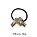 Gedetailleerd overzicht van het elegante geometrische metalen knoop haarelastiek. - 1105-15