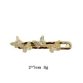 Goldfarbene Schmetterlings-Haarspange mit glitzernden Strasssteinen, elegante Klammer. - Gold Strass Schmetterling Stil / Gold