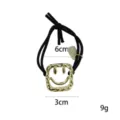 Black hair band with gold smiley face charm, elastic ponytail holder, stylish hair accessory. - Square Smile Pendant (1111-5)