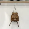 Brown quilted chain backpack, stylish faux leather mini daypack with turn-lock closure. - Brown