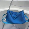 Bright blue mesh underarm shoulder bag with chunky chain strap for women daily commute style - Light Blue