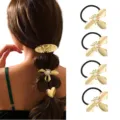 Detailed close-up of golden metal bow hair ties and hair clips showing exquisite texture. - Geometric Artificial Pearl Hair Accessories (Set 33) / Set of 4 / Gold