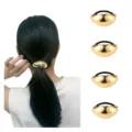 Gold metal dome ponytail holder hair tie detail view showing shiny metallic finish and elastic. - Arc Hemisphere Ponytail Clip (Set 48) / Set of 4 / Gold
