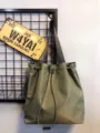Green nylon bucket shoulder bag, casual tote handbag with drawstring, stylish everyday accessory. - Green