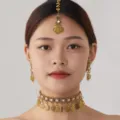 Bohemian vintage gold choker necklace earrings and maang tikka set with pink gemstone accents. - Pink