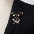 Vintage style safety pin brooch detail, gothic black gem and pearl dangle accessory for women. - Black