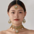 Exquisite Indian ethnic crystal choker necklace earrings and maang tikka jewelry set for women. - White