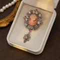 Exquisite vintage cameo brooch with sparkling rhinestones, palace style intricate metalwork. - Style 10