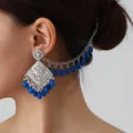 Ethnic vintage carved hollow ear studs with blue bead tassel for women fashion style. - Silver Blue