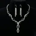 Close up detail of black marquis rhinestone necklace and tassel earrings set, elegant bridal jewelry. - Black