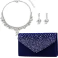 Detailed view of the luxury blue rhinestone evening clutch and crystal necklace set. - Blue