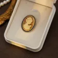 Detailed closeup of vintage cameo portrait brooch, elegant court style jewelry design. - Style 5 (Vintage Relief)