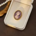 Vintage cameo brooch detailed view, elegant purple lady profile in gold tone frame. - Style 9 (Purple Relief)