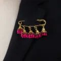 Vintage bohemian gold pin brooch with pink beaded bell tassels for women fashion details. - Rose Red