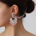 Detailed shot of ethnic vintage style silver ear chain with pink beads, exquisite design. - Silver Pink