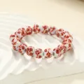 Elegant red floral ceramic beaded bracelet for women, traditional style handmade jewelry. - Red