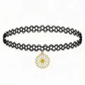 Close-up detail of the black tattoo choker featuring a charming white and yellow daisy pendant. - Daisy Pendant