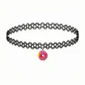 Close-up of black elastic tattoo choker necklace with cute pink donut pendant and sprinkles. - Pink Doughnut Pendant