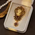 Vintage cameo brooch with rhinestones and gold-tone filigree for women accessory. - Style 2