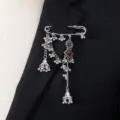 Bohemian vintage silver brooch pin with tassels bells and red stone for women fashion - Red