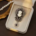 Exquisite vintage cameo rhinestone brooch detail, elegant silver tone filigree pin for women. - Style 9
