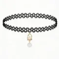 Close-up detail of the black tattoo choker necklace with cute pendant and pearl drop. - Pearl Pendant