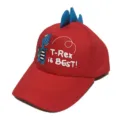 Close-up detail of red kids baseball cap with blue 3D dinosaur spines and cute cartoon print. - One Size / Cloth Hat Small Dinosaur / Red