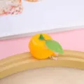 Cute mini orange duckbill hair clip, 3d simulated fruit hairpin detail close up view. - Orange