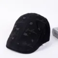 Black distressed flat cap with fashion embroidery, stylish ivy cap for casual street wear. - Adjustable / B-Black