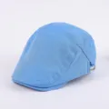 Light blue cotton flat cap with side tag detail, stylish casual ivy newsboy cap for men. - Adjustable / Blue