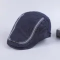Detailed view of dark blue cotton flat cap for men, featuring stylish white stitching. - Adjustable / Navy Blue