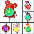 Divertidos molinillos de viento de plástico con animales de dibujos para jugar al aire libre. - Estilo Mixto