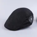 Classic black cotton flat cap for men, vintage style casual beret with side patch detail. - Adjustable / Black