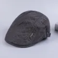 Classic mens dark gray cotton flat cap with stylish diamond stitching and metal badge detail. - Adjustable / Dark Gray